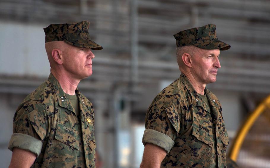 Marine Brig. Gen. William J. Bowers, right, assumes command of Marine Corps Installations Pacific from Maj. Gen. Paul J. Rock Jr. at Marine Corps Air Station Futenma, Okinawa, Japan, on Friday, July 26, 2019. Carlos Vazquez/Stars and Stripes