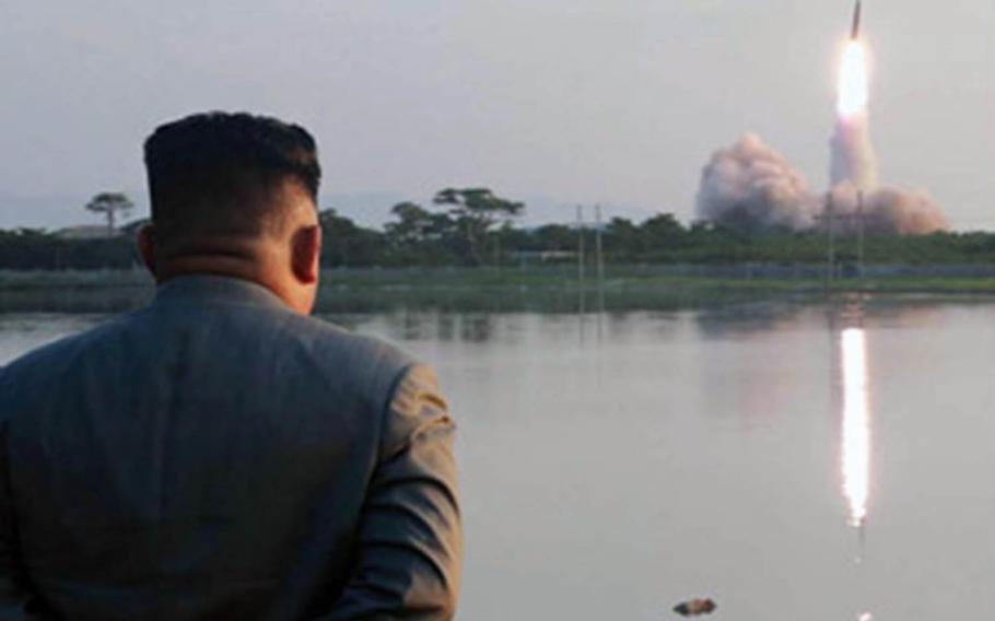 North Korean leader Kim Jong Un watches a missile launch in this undated photo released by the Korean Central News Agency, Friday, July 26, 2019.