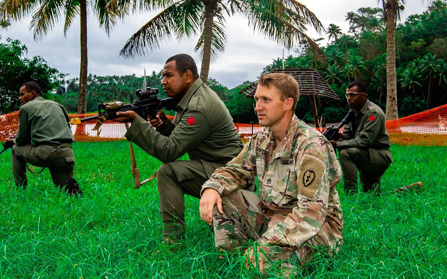 Army Staff Sgt. Clinton Danforth trains with his Fijian army counterparts in Savusavu, Fiji, Aug. 3, 2019.