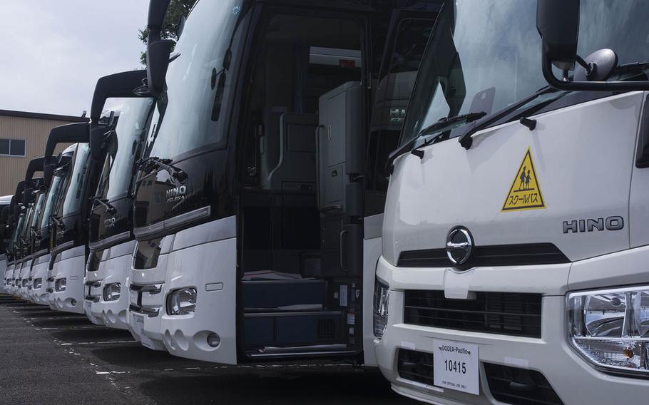 The Department of Defense Education Activity in Japan is rolling out new touring-style school buses at its schools on the main islands. The buses are shown here at Yokota Air Base on Aug. 16, 2019.