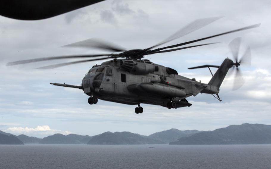 A CH-53E Super Stallion from Marine Heavy Helicopter Squadron 462 at Marine Corps Air Station Futenma trains over Okinawa, June 7, 2019.