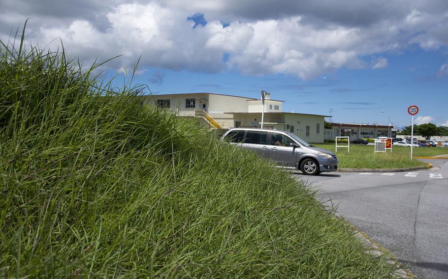 High grass continues to grow near facilities at Camp Foster, Okinawa, Aug. 30, 2019.