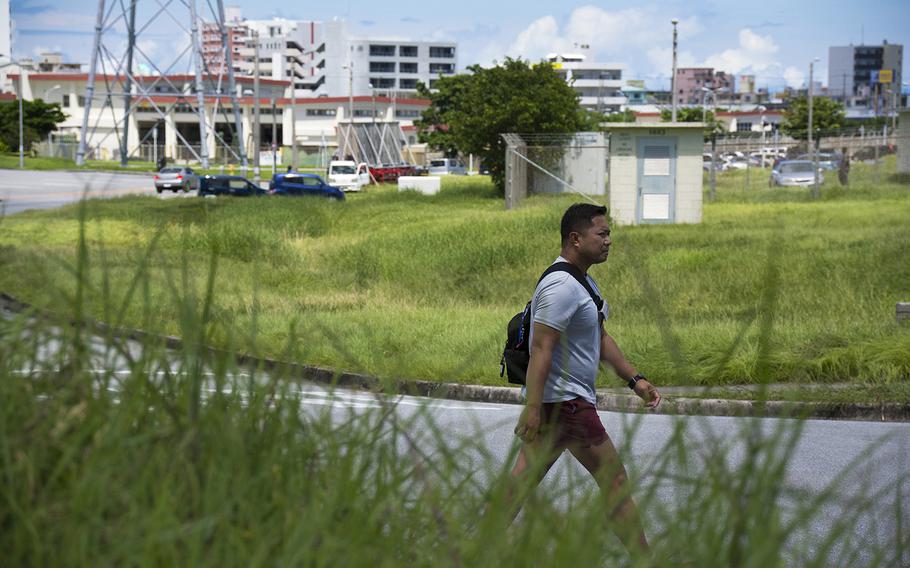 High grass continues to grow near facilities at Camp Foster, Okinawa, Aug. 30, 2019.