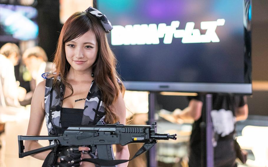 A cosplay actress for DMM.com poses during a past Tokyo Game Show in Makuhari, Japan.