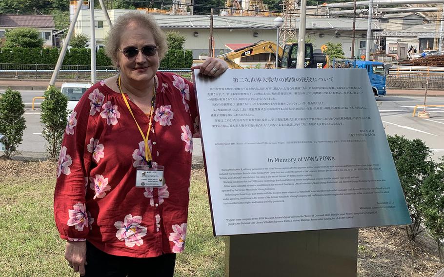 Georgianne Burlage, 64, of Denton, Texas, traveled on Wednesday, Sept. 4, 2019, to the site of a Japanese prison camp where her father, George Burlage, was held during World War II.