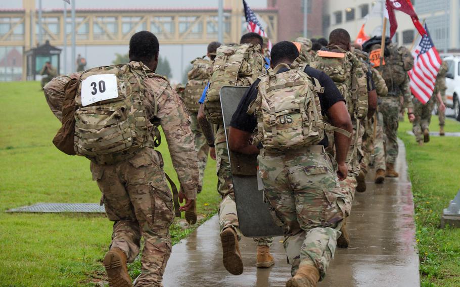 Soldiers from across South Korea participate in the 9/11 Memorial Ruck March at Camp Humphreys, South Korea, Wednesday, Sept. 11, 2019.