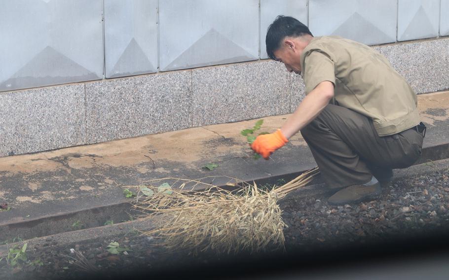 North Korean soldiers and workers repaired typhoon damage at the Joint Security Area on the border from Sept. 12-14, 2019.