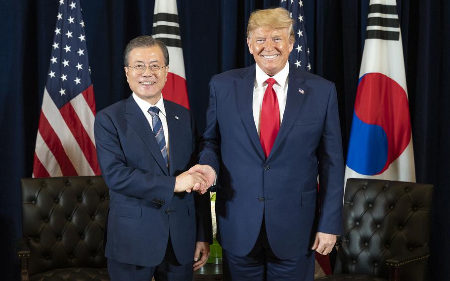 South Korean President Moon Jae-in and President Donald Trump pose on the sidelines of the United Nations General Assembly in New York, N.Y., Monday, Sept. 23, 2019.