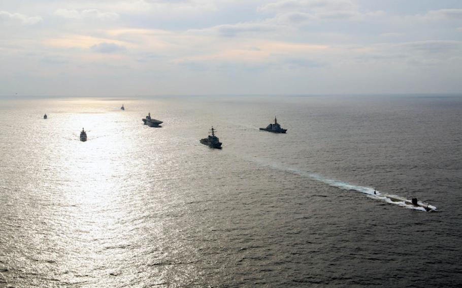 The submarine USS Oklahoma City steams ahead of U.S., Japan Maritime Self-Defense Force and Indian Navy vessels off southern Japan during Exercise Malabar 2019 on Sept. 30, 2019.