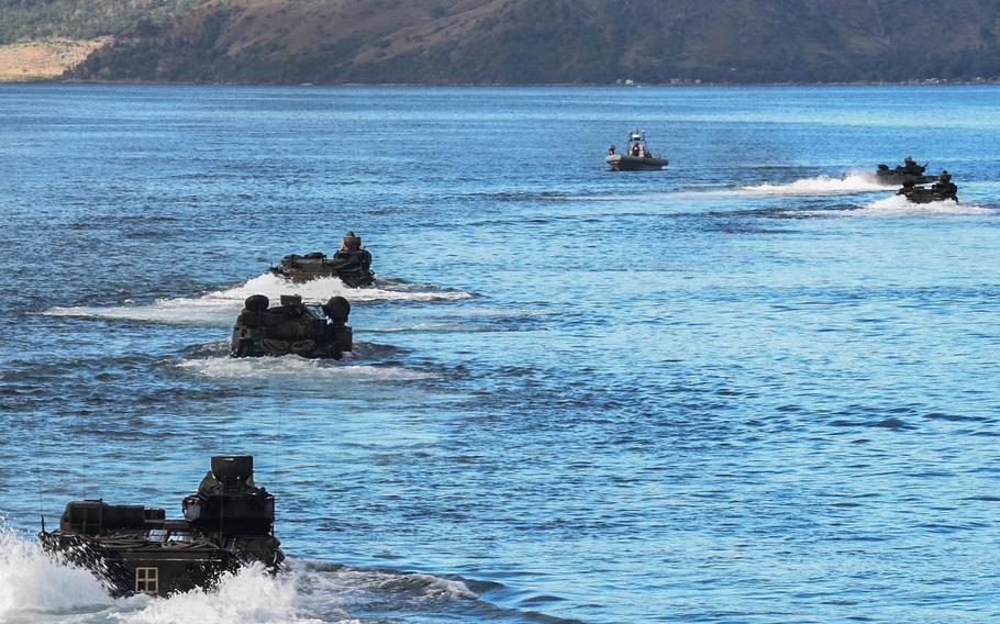 Amphibious assault vehicles carrying Marines from 2nd Battalion, 2nd Marine Regiment depart the USS Germantown in preparation for Kamandag drills in Subic Bay, Philippines, Monday, Oct. 7, 2019.