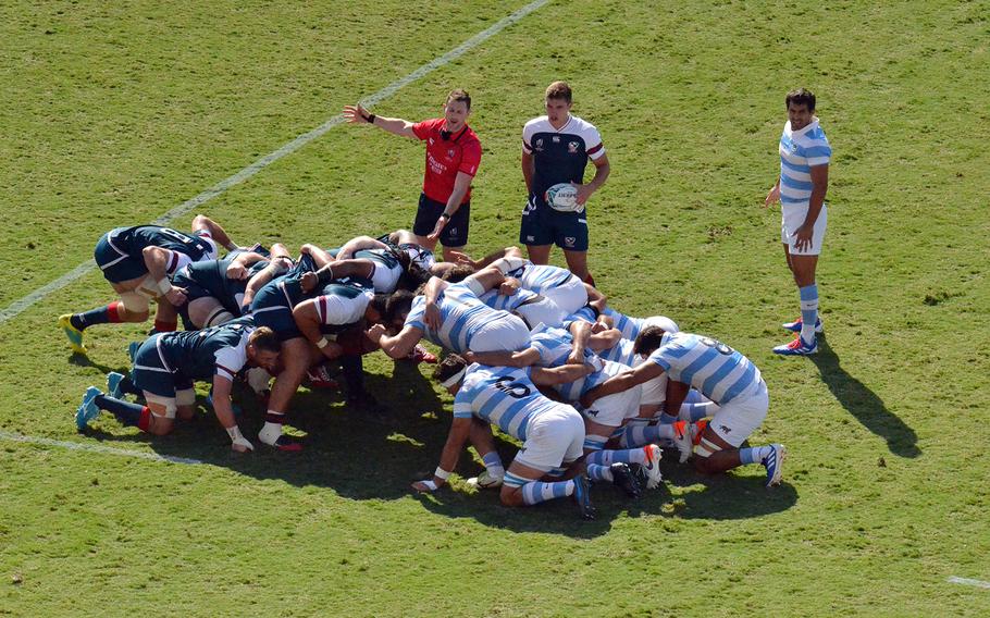 The U.S. and Argentina national rugby teams pack down a scrum during their Rugby World Cup match in Kumagaya, Japan, Wednesday, Oct. 9, 2019.