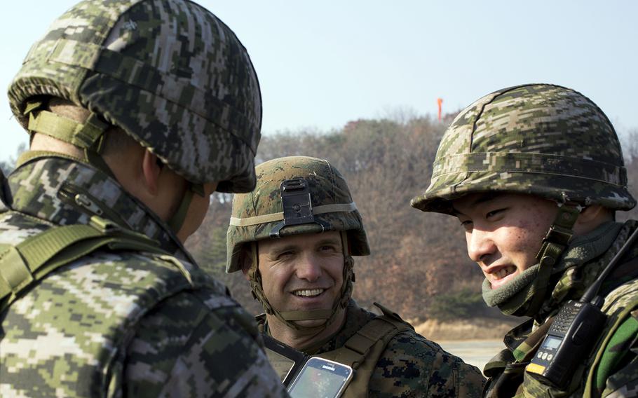 U.S. and South Korean marines socialize during a past joint training exercise in Pocheon, South Korea.