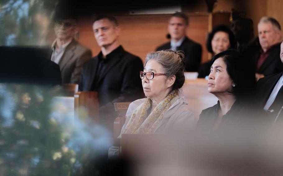 Wol Yo Dressler, center, attends a memorial ceremony for her late husband, Army veteran Kurt Dressler, 91, inside South Post Chapel at Yongsan Garrison, South Korea, Friday, Nov. 1, 2019.