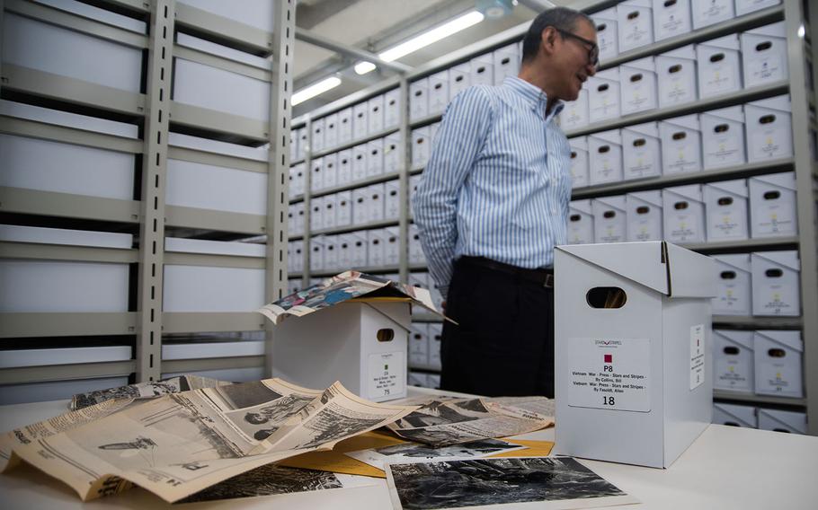 Boxes filled with photographs, newspaper clippings and other materials line the walls of Stars and Stripes Pacific's library at Hardy Barracks in Tokyo, Thursday, Oct. 31, 2019.