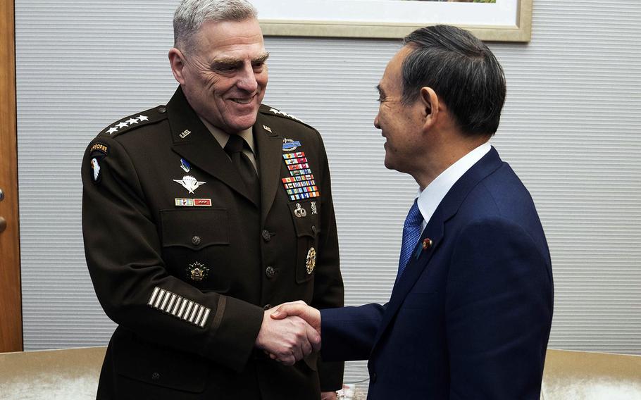 Gen. Mark Milley, chairman of the Joint Chiefs of Staff, meets with Japanese Chief Cabinet Secretary Yoshihide Suga at the Kantei in Tokyo, Wednesday, Nov. 13, 2019.