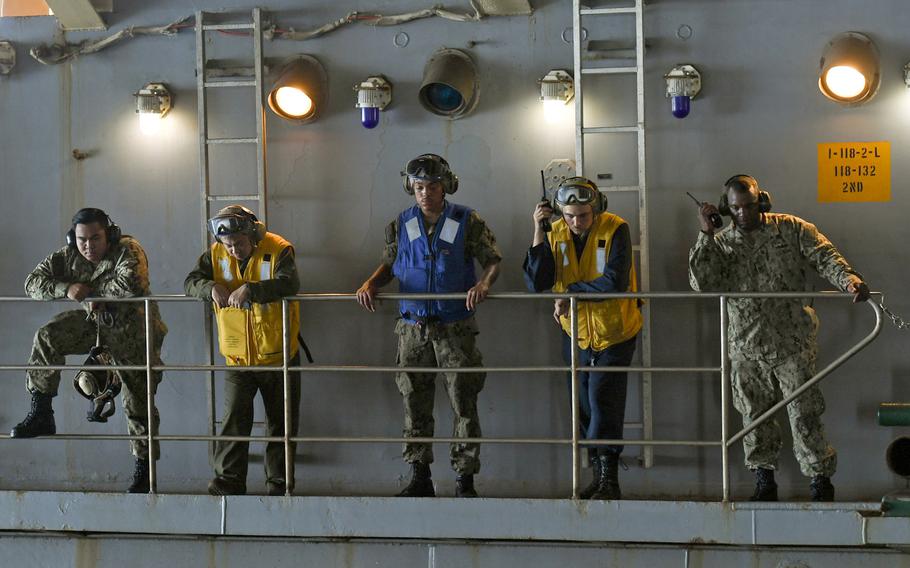 Boatswain's mates prepare to launch a landing craft from the  USS Germantown during exercise Tiger Triumph, in the Bay of Bengal, India, on Nov. 17, 2019.