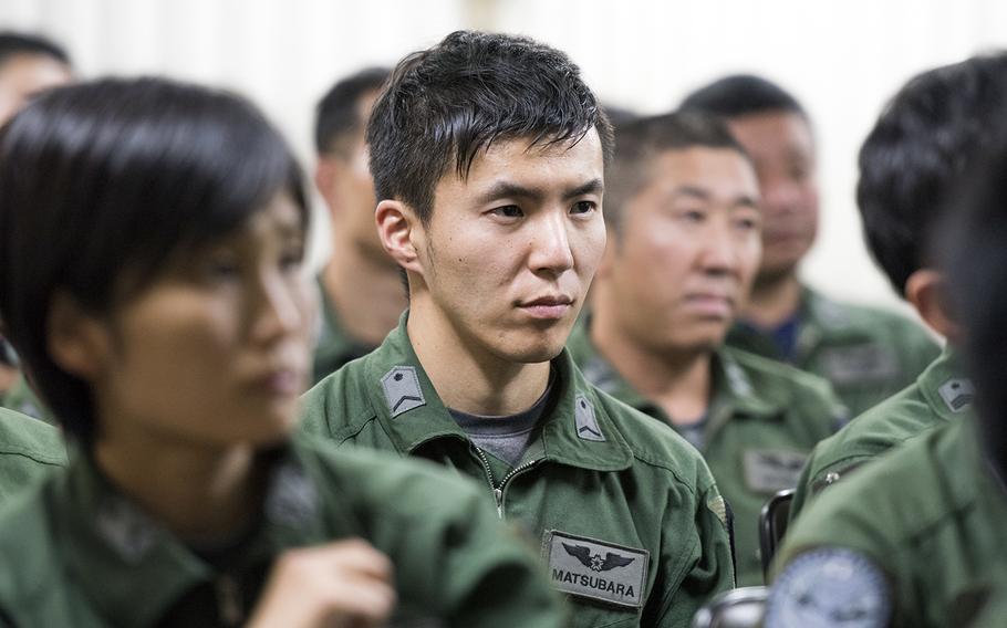 Members of the Japan Air Self-Defense Force listen to a briefing at Iruma Air Base, Japan, July 10, 2019.