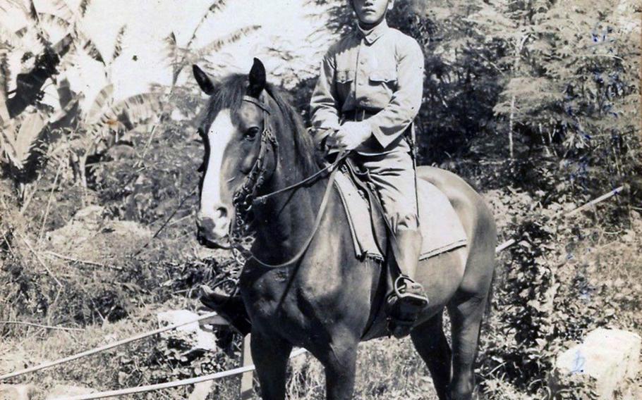 A photograph of Hideo Shikata on horseback, taken sometime during World War II, was returned with about 20 others to his family in Japan on Sunday, Nov. 24, 2019.