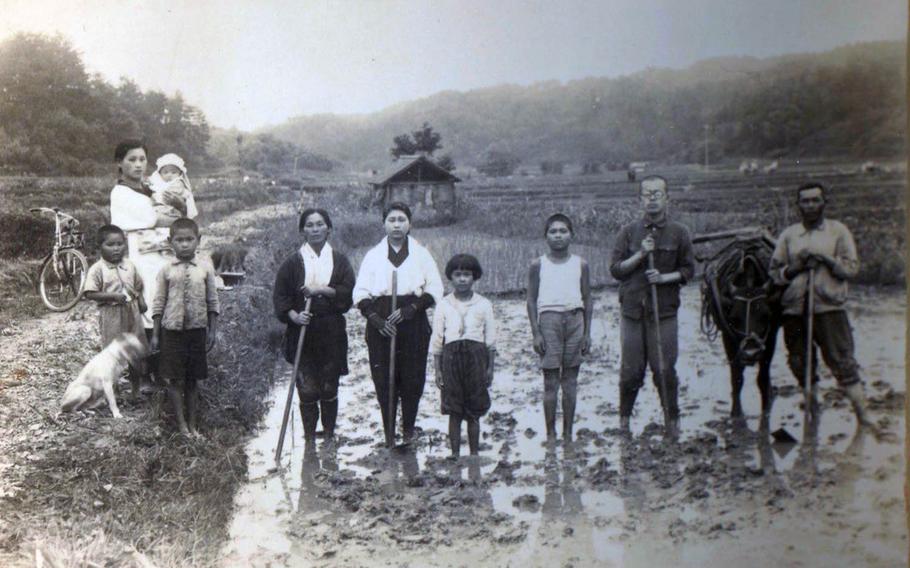 A photograph of Hideo Shikata's family, which he carried during World War II, was returned to his family in Japan on Sunday, Nov. 24, 2019.