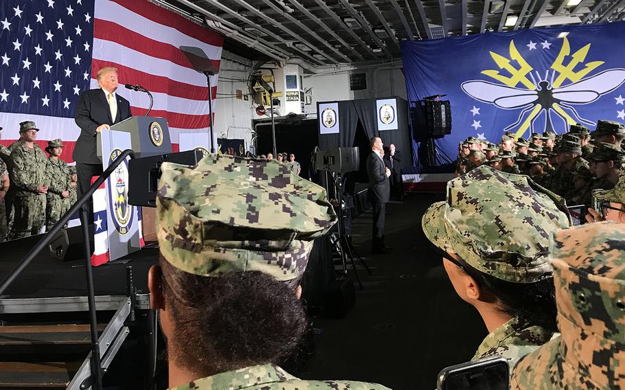 Japan-based sailors and Marines listen to President Donald Trump speak aboard the USS Wasp in Yokosuka, Japan, May 28, 2019.