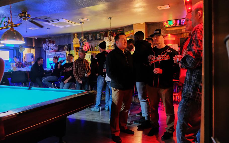 Airmen from the 51st Fighter Wing relax at a bar just outside Osan Air Base, South Korea, on Saturday, Dec. 14, 2019.