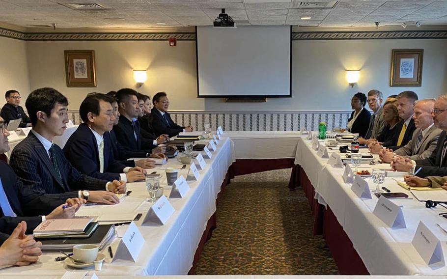 South Korean negotiators, left, meet with their U.S. counterparts for a sixth round of defense cost-sharing talks Tuesday, Jan. 14, 2020, in Washington, D.C.