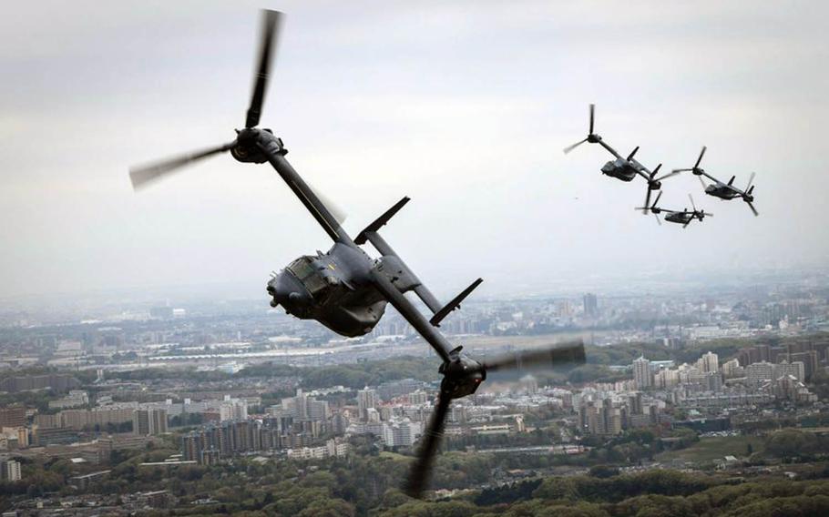 Air Force CV-22 Ospreys assigned to the 353rd Special Operations Group fly over Tokyo, April 5, 2018.