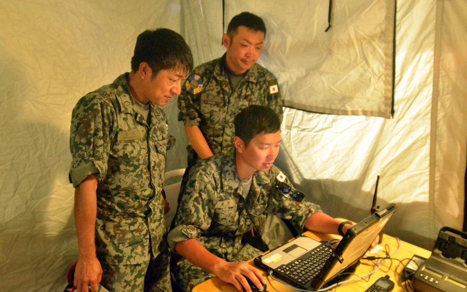 Japan Air Self-Defense Force members participate in a Cope North disaster response and humanitarian assistance exercise on the island of Tinian, Tuesday, Feb. 18, 2020.