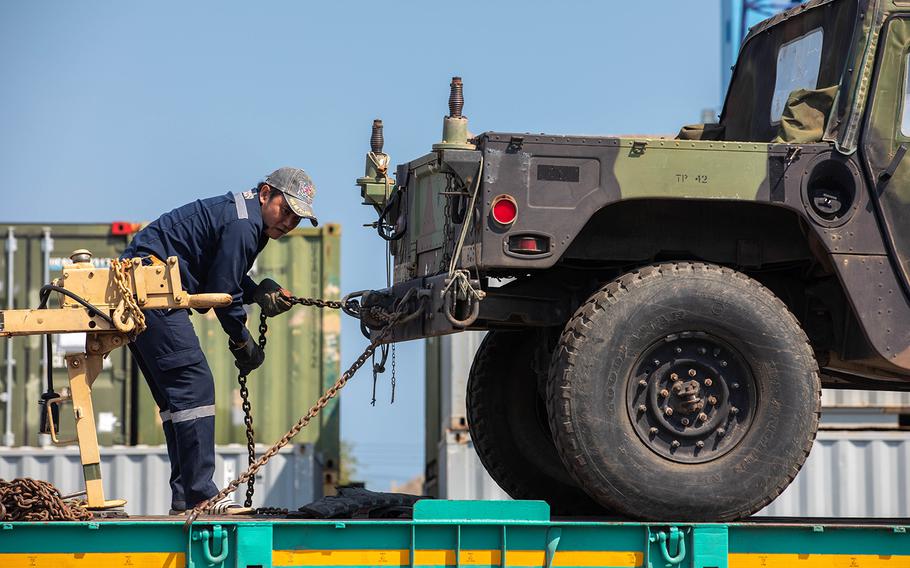 U.S. military vehicles are off-loaded in Chuk Samet, Thailand, Feb. 17, 2020, ahead of the multinational Cobra Gold exercise.