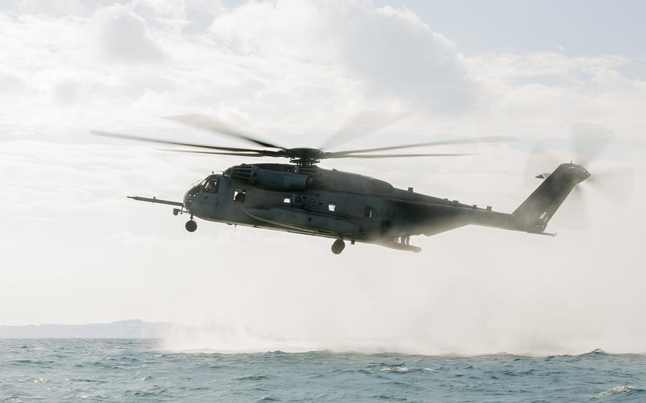 Members of the III Marine Expeditionary Force train from a CH-53E Super Stallion in Kin, Okinawa, Dec. 10, 2019.