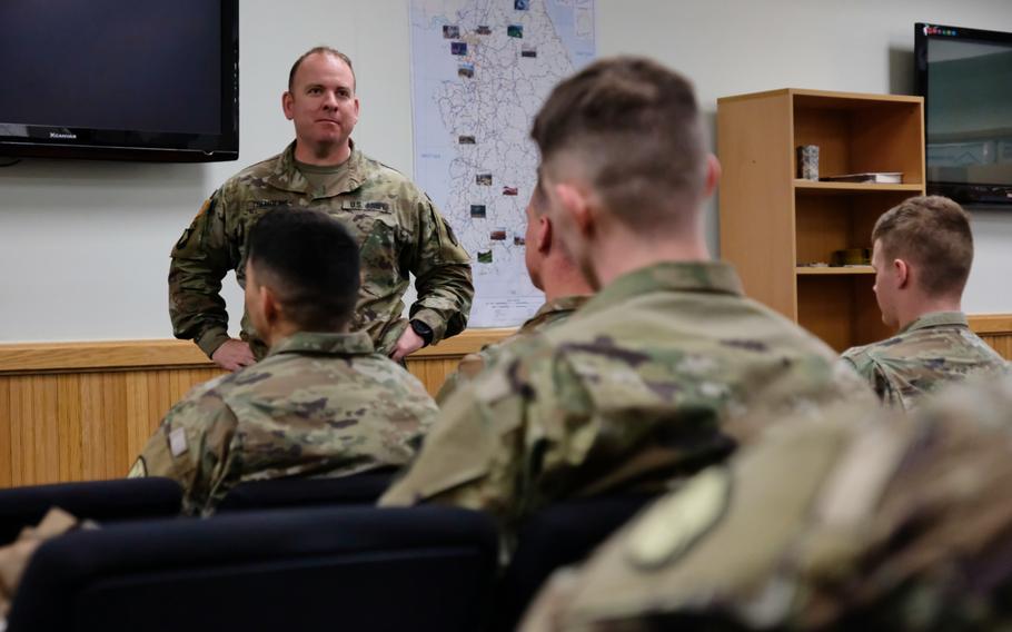 Camp Humphreys garrison commander Col. Michael Tremblay briefs soldiers new to South Korea before they depart for Daegu, Tuesday, March 3, 2020.