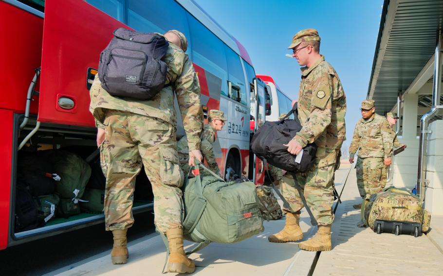 Soldiers prepare to depart Camp Humphreys, South Korea, for U.S Army Garrison Daegu, Tuesday, March 3, 2020.