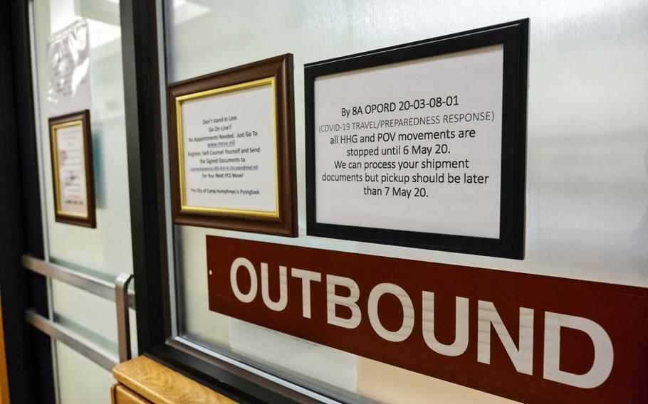 A sign posted outside the transportation office informs customers of suspended movement at Camp Humphreys, South Korea, Wednesday, March 11, 2020.
