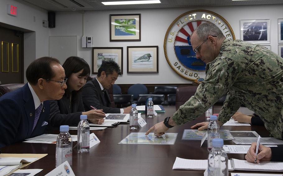 Sasebo Naval Base commander Capt. Brad Stallings meets with Sasebo city mayor Norio Tomonaga at the installation, Feb. 19, 2020.