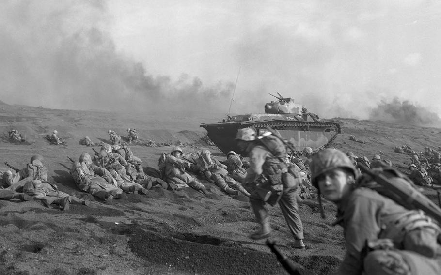 This undated photo from the National Archives depicts the Marine Corps' 27th Regiment, 2nd Battalion landing on Iwo Jima in 1945.