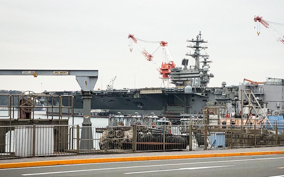 The aircraft carrier USS Ronald Reagan is seen at Yokosuka Naval Base, Japan, Monday, March 30, 2020.