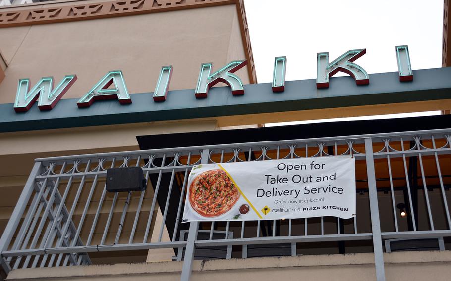 With a ban on sit-down dining, some eateries in Waikiki, Hawaii, still offer take-out and delivery meals.