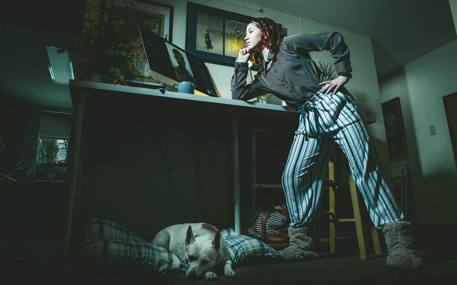 Sage Payer models at coronavirus quarantine outfit inside her home at Yokota Air Base, Japan. The image is part of a series produced with her mother, Cari Payer, called the COVID-19 Spring Collection.