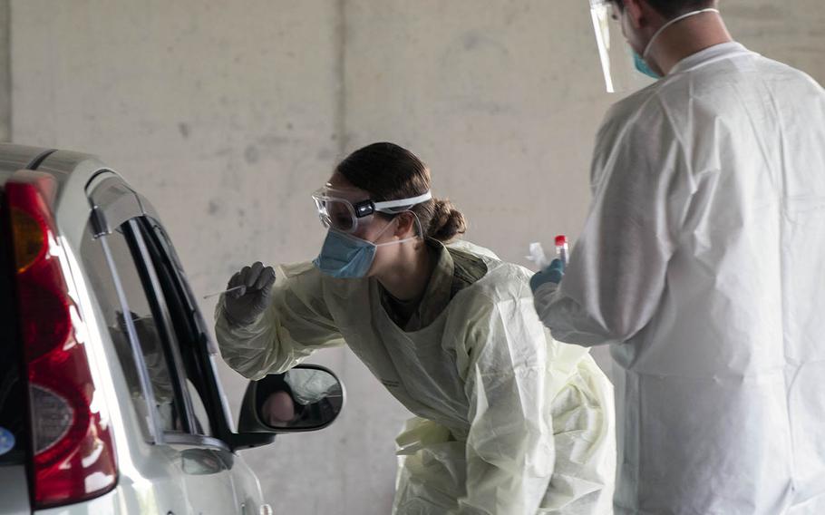 Airmen from the 18th Medical Group conduct COVID-19 testing at Kadena Air Base, Japan, on March 20, 2020.