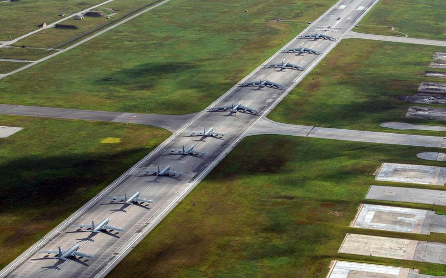 A Navy MH-60S Knighthawk, Air Force RQ-4 Global Hawk, Navy MQ-4C Triton, Air Force B-52 Stratofortresses and KC-135 Stratotankers perform an "elephant walk" at Andersen Air Force Base on Monday, April 13, 2020.