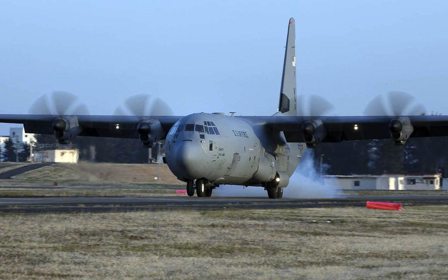 A C-130J Super Hercules touches down on a taxiway during assault landing training late last month at Yokota Air Base, Japan, March 26, 2020.