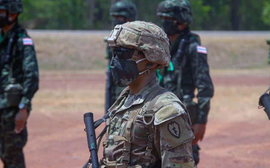 A soldier assigned to 25th Infantry Division stands at attention March 30, 2020, at Krabi, Thailand, during the opening ceremony of the Hanuman Guardian exercise.