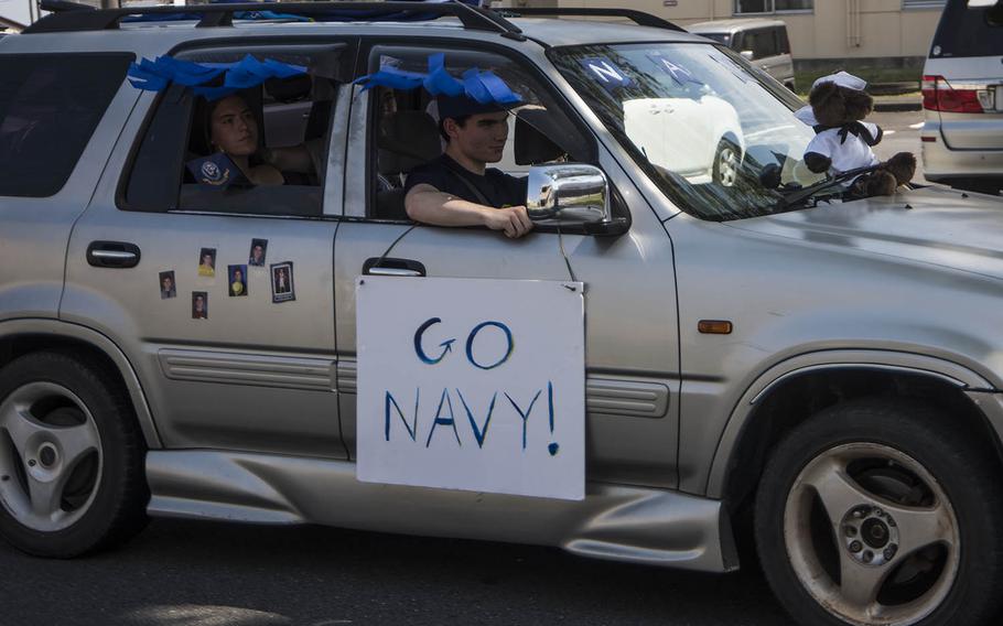 Yokota High School seniors who plan to enlist in the U.S. Navy were among those taking part in a decision day parade at Yokota Air Base, Japan, Friday, May 1, 2020.