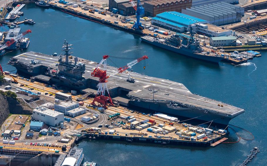 The aircraft carrier USS Ronald Reagan is seen from the air at Yokosuka Naval Base, Japan, April 25, 2020.