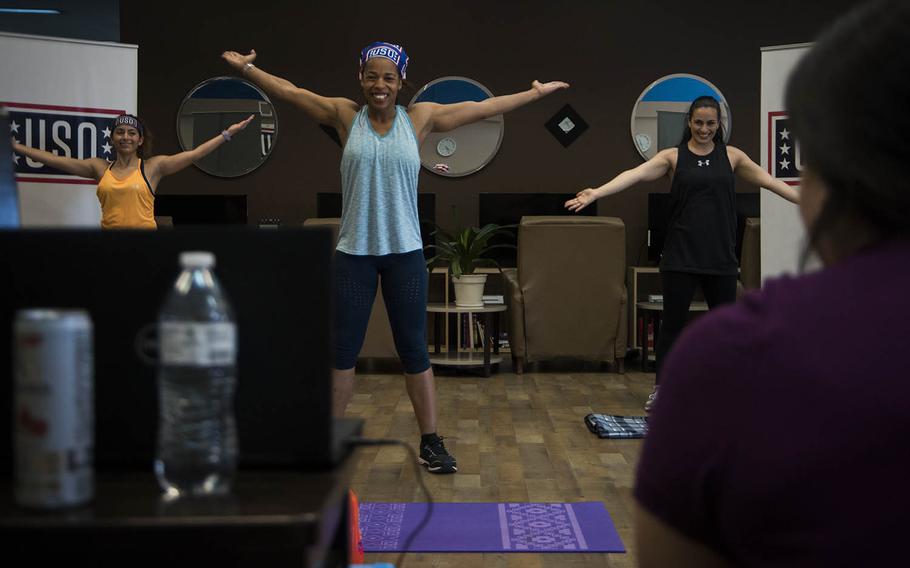 LaDonna Spivey, a personal trainer and volunteer for the USO at Yokota Air Base in western Tokyo, leads a workout via Facebook Live on Thursday, May 14, 2020.