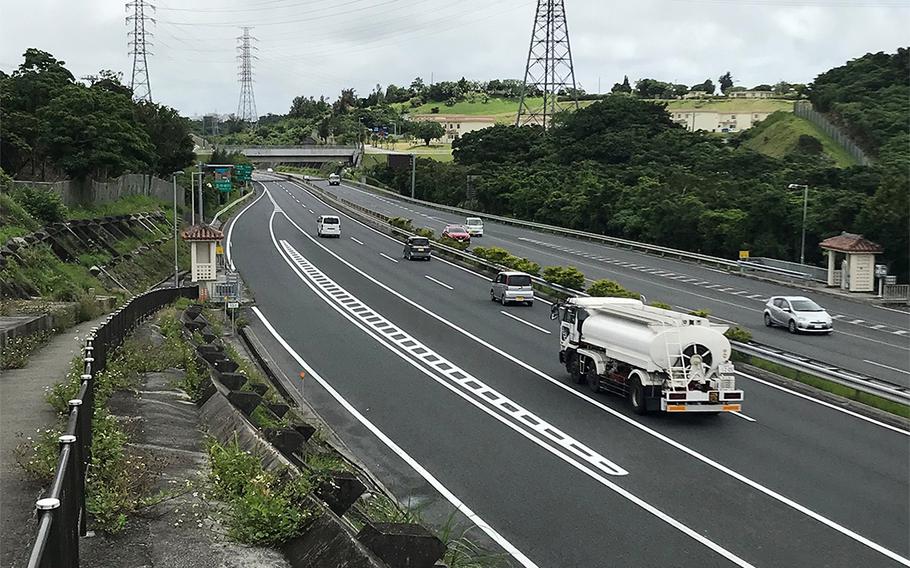 Vehicles travel the Okinawa Expressway near Kitanakagusuku on Friday, May 15, 2020.