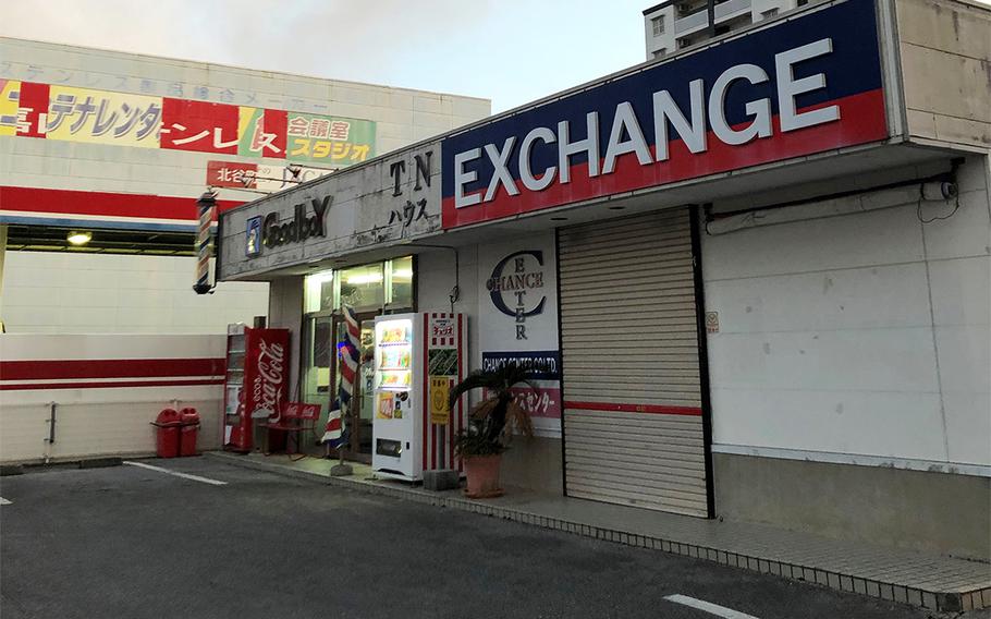 Police say two mask-wearing perpetrators robbed this currency exchange store across from Camp Foster, Okinawa, Tuesday, May 12, 2020.
