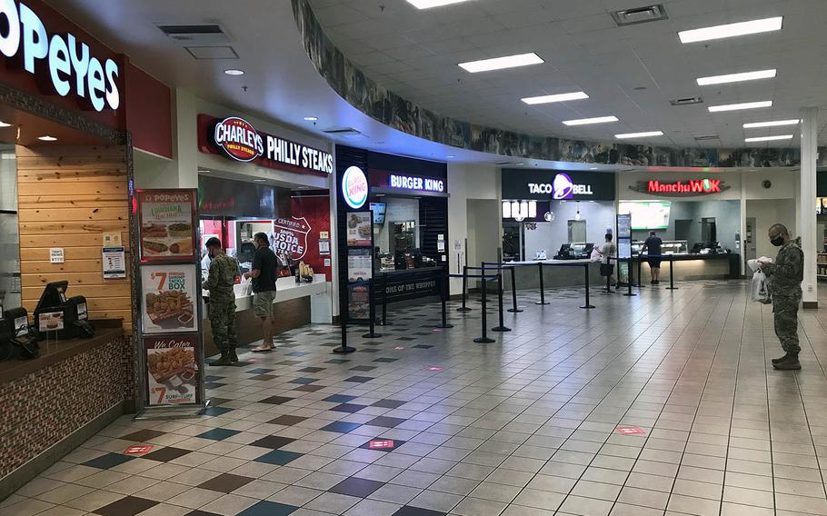 Service members and Defense Department civilians patronize the Kadena Air Base food court on Okinawa, Japan, on Wednesday, May 20, 2020, one day before it is scheduled to open again for dine-in services.
