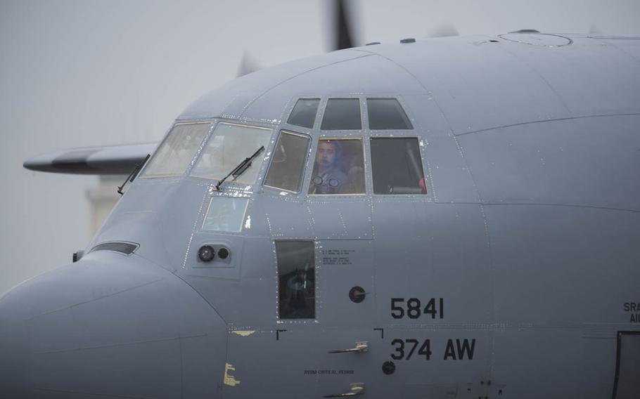A C-130J Super Hercules from the 374th Airlift Wing taxis during an elephant walk at Yokota Air Base, Japan, Thursday, May 21, 2020.