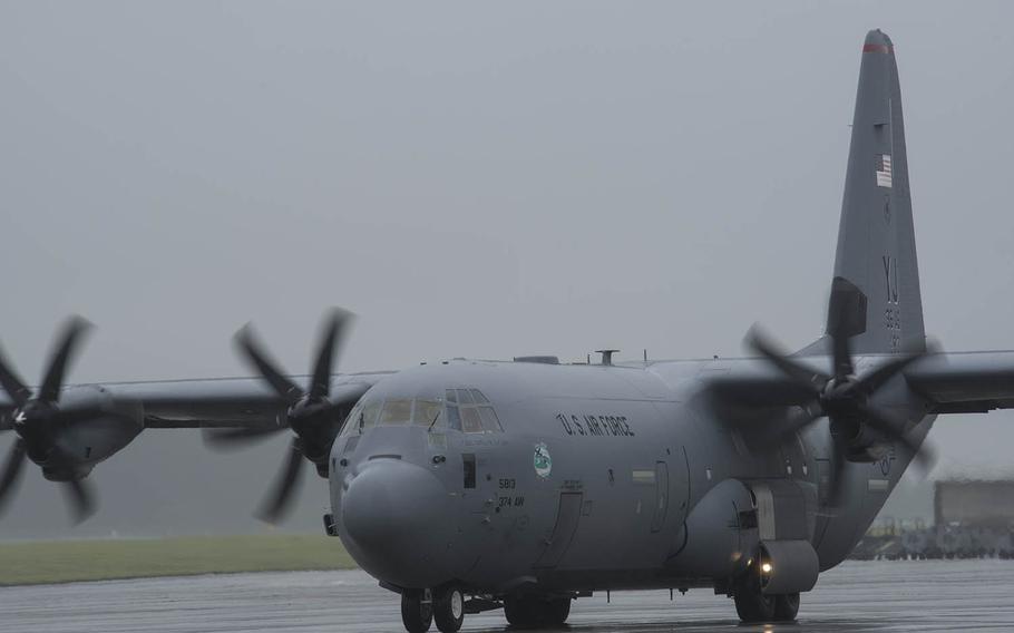 A C-130J Super Hercules from the 374th Airlift Wing taxis during an elephant walk at Yokota Air Base, Japan, Thursday, May 21, 2020.